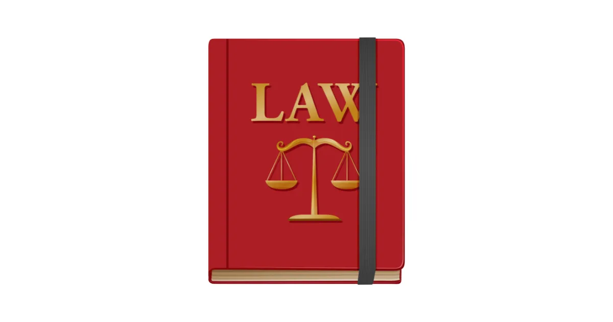 「LAW(法律)」と天秤のマークが描かれた赤色の本。退職は法律で認められた労働者の権利であり、罪悪感をもつ必要がない理由を示す。