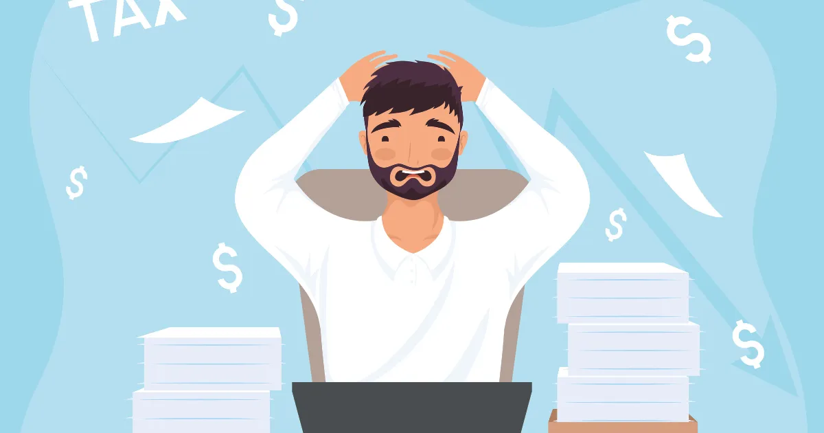山積みになった領収書に囲まれて、パソコンの前でパニックになっている男性のイラスト。この記事のテーマ「確定申告めんどくさい」を表している